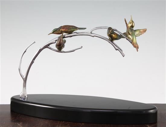 A French Art Deco silvered and painted bronze figure group, modelled as four humming birds, 13.75in.
